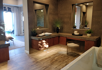 Luxurious master bedroom remodel with modern lighting and custom shelving in Burbank home.