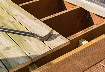 Old wooden deck being replaced with new, durable materials in La Canada Flintridge.